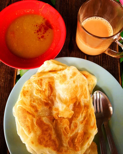 Roti canai é um popular prato malaio . — Fotografia de Stock