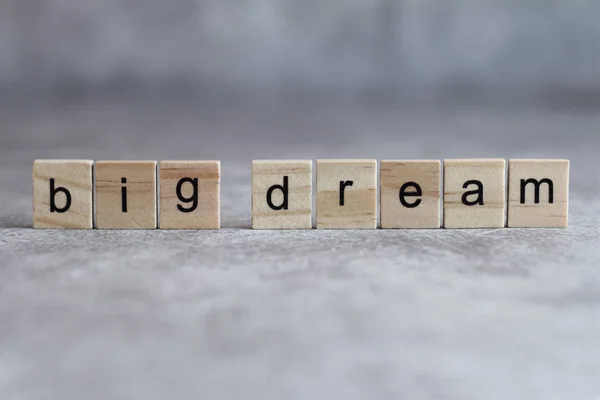 Big dream word written on wood cube — Stock Photo, Image