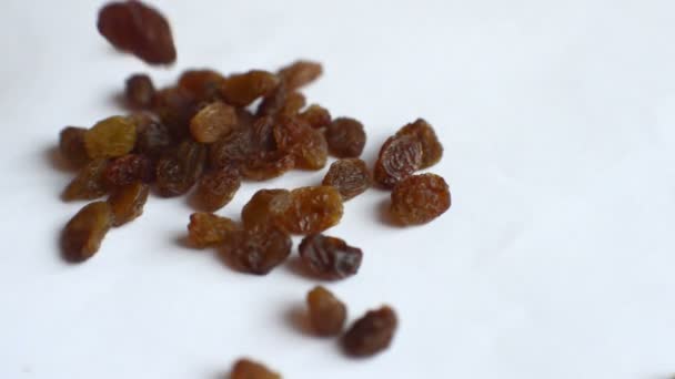 Yellow raisins pours down — Stock Video