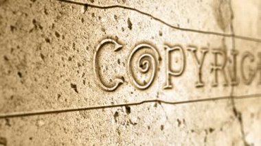Duvarda Mısır alfabesiyle telif hakkı