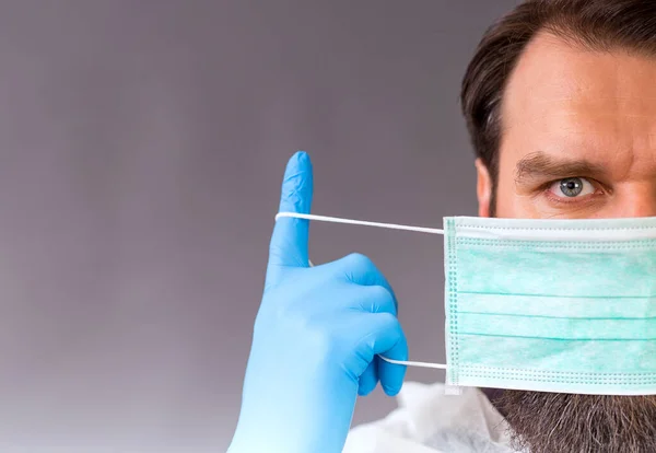 Young Man Putting Protective Mask His Face Antivirus Individual Protection — Stock Photo, Image