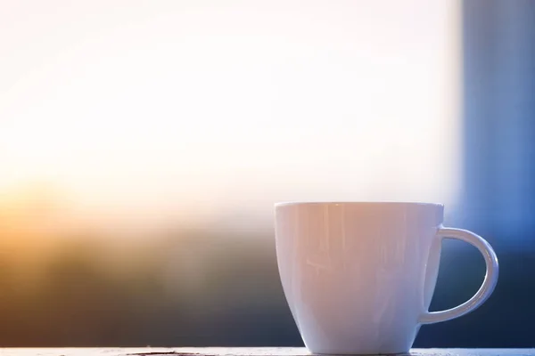 Coffee cup with sunlight — Stock Photo, Image