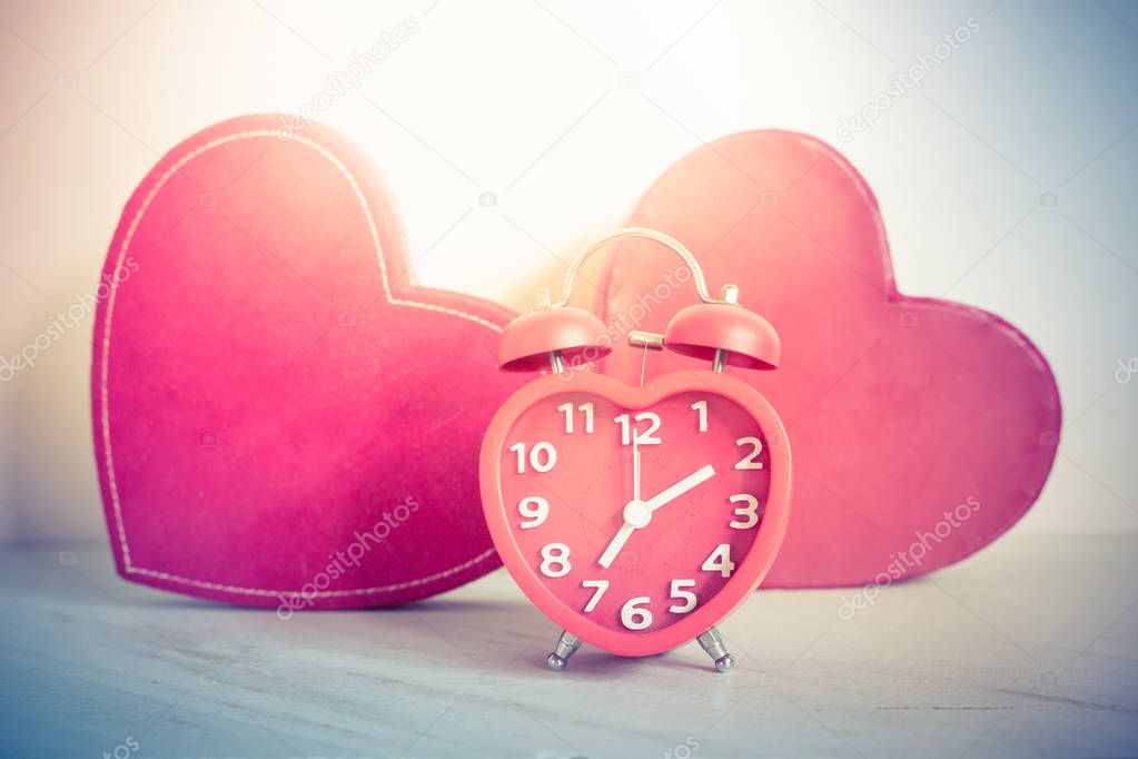 Red alarm clock of love