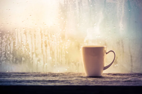 Coffee cup with rain — Stock Photo, Image