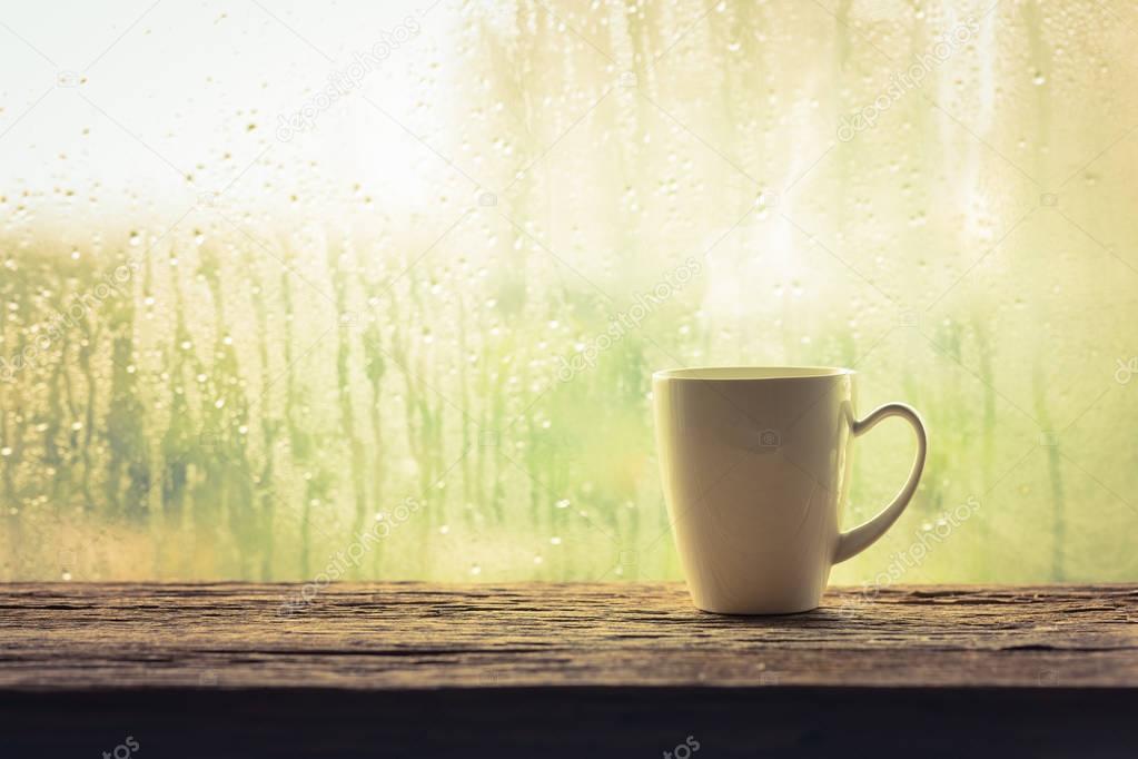 Coffee cup with rain