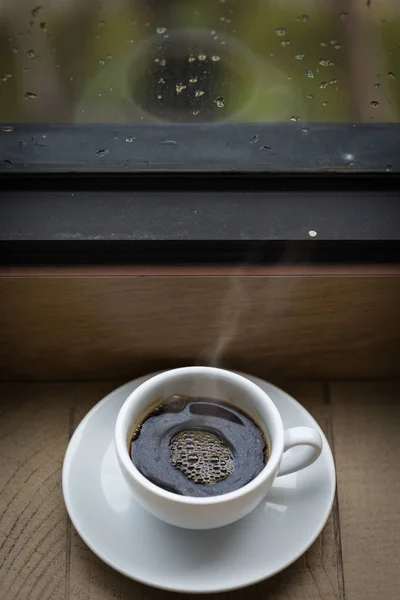 Coffee cup with the rain — Stock Photo, Image