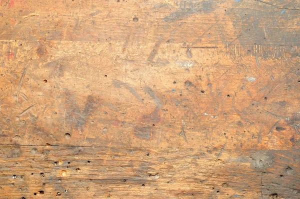 Gamla begagnade smutsiga workbench för bakgrund eller konsistens. Stockbild