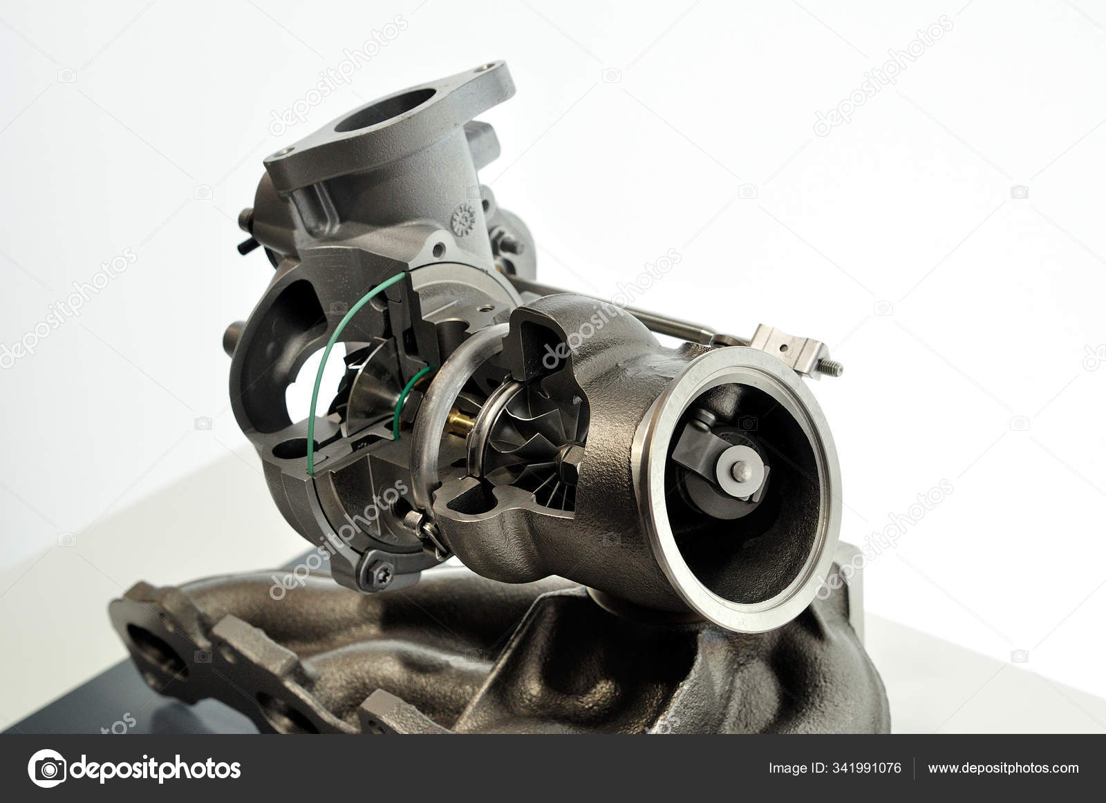 Cross section of turbocharger, isolated. Stock Photo by ©lorakss 341991076