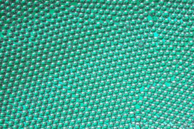 Arkaplan olarak küçük cam toplar yakın plan