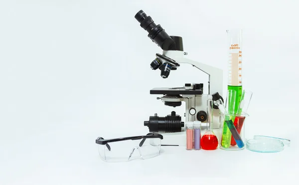 science laboratory glassware and microscope ,Group of laboratory