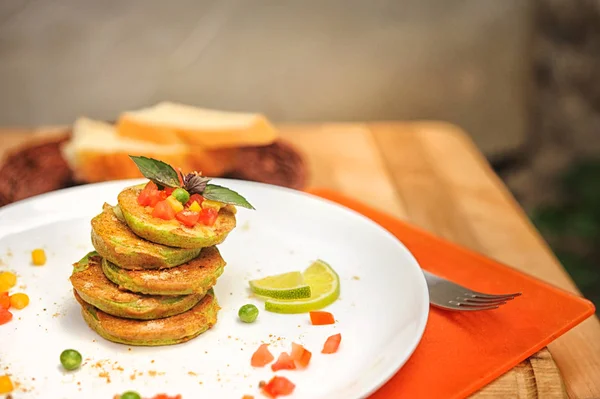 Fritters from zucchini courgettes, vegetable vegetarian fritters — Stock Photo, Image