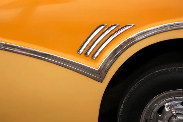 Close up of part of a yellow 1950's classic car, in Havana, Cuba — Stock Photo, Image