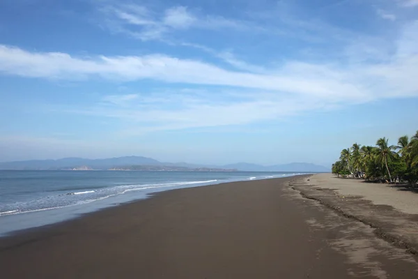 Long brown sandy beach of Puntarenas, Costa Rica, Central America. — Stock Photo, Image