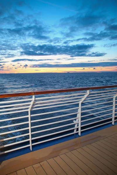 Sunset from the deck of a cruise ship across the ocean, cruising the Mediteranean Sea.