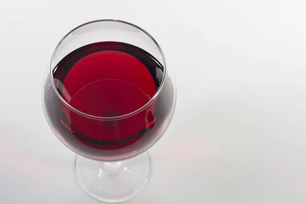 Red wine in glass, viewed from the top corner. — Stock Photo, Image