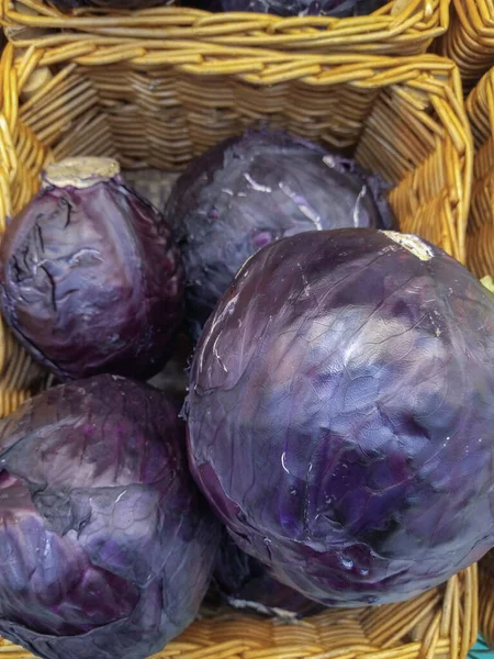 Red cabbage on the shelf in the store Close-up