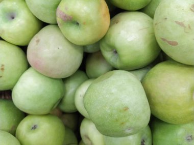 Yeşil Elma Arkaplanı, sığ alan derinliği. Yakın plan.