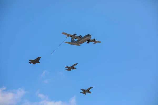 Aerial refueling of military aircraft operation, tansferring aviation fuel from the tanker to aircraft — 스톡 사진