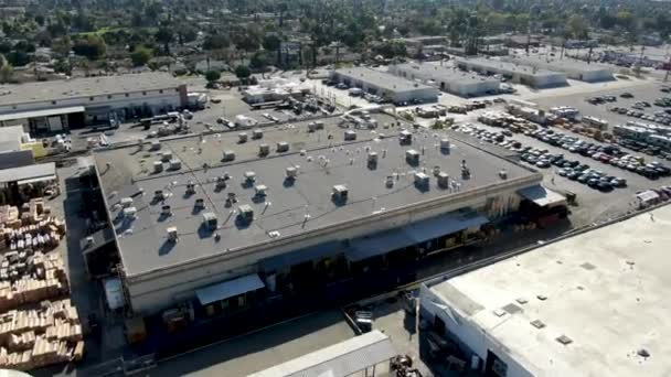 Aerial view to industrial zone and company storage warehouse in RIverside — Stock Video