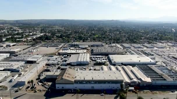 Aerial view to industrial zone and company storage warehouse in RIverside — Stock Video