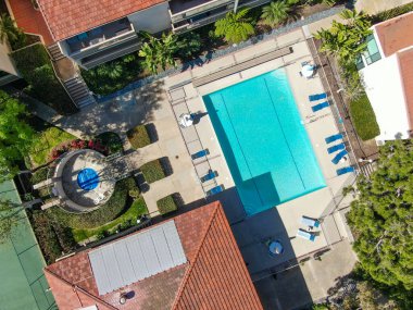 Aerial top view of typical south california community condo with swimming pool