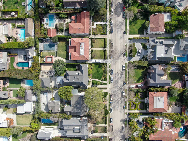 Aerial top view of wealthy area with big houses and small street in Central Los Angeles , California. USA