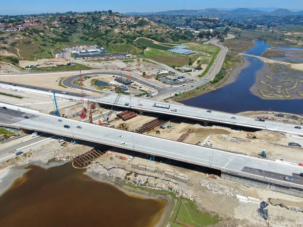 Aerial view of highway bridge construction over small river — Stock Photo, Image