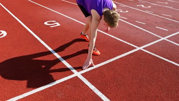 Track Runner Boy Teenager Preparing Run Starting Line — Stock Video