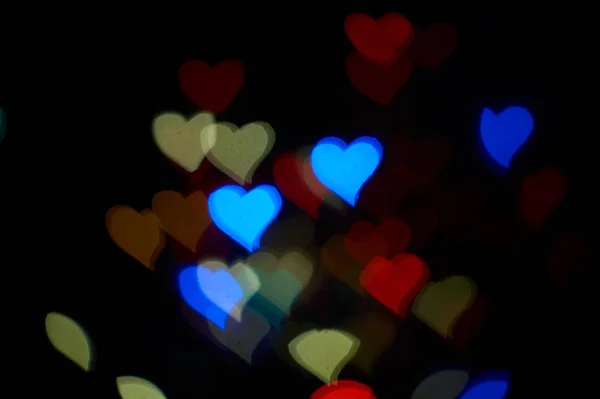 Bokeh forma de coração de fundo de luz de rua, fundo de coração amor — Fotografia de Stock