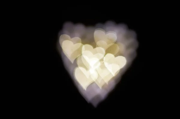 Kärlek och Valentine hjärta symbol bokeh fotograferad, perfekt som en bakgrundsbild — Stockfoto