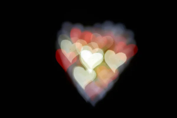 Love and valentine heart symbol bokeh photographed, ideal as a background image — Stock Photo, Image