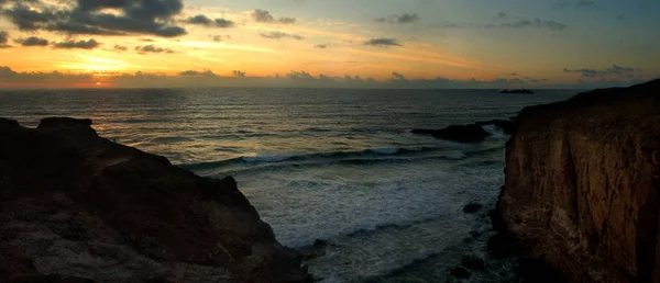 Güzel bir gün batımı Cornish üzerinde plaj Gwithian