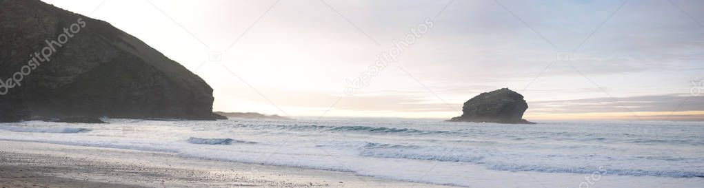 A panoramic of Gull rock in the evening sun, Portreath, Cornwall, England