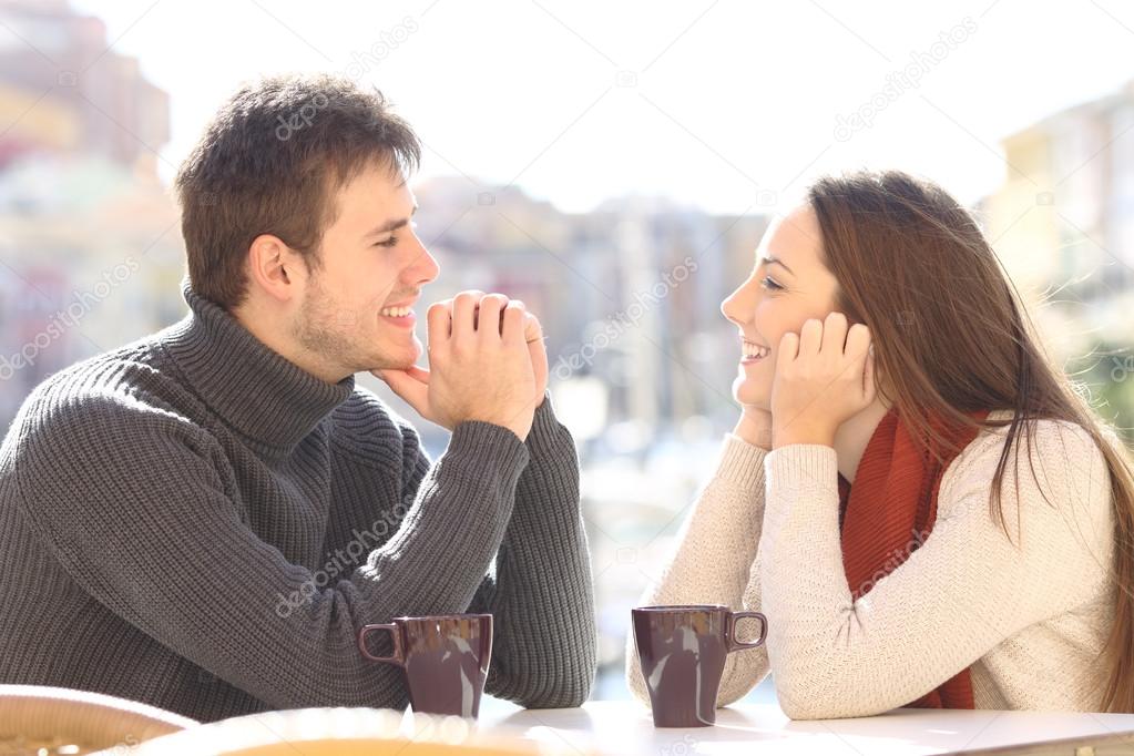 Couple dating and flirting looking each other