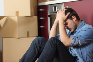Sad evicted man worried moving house clipart