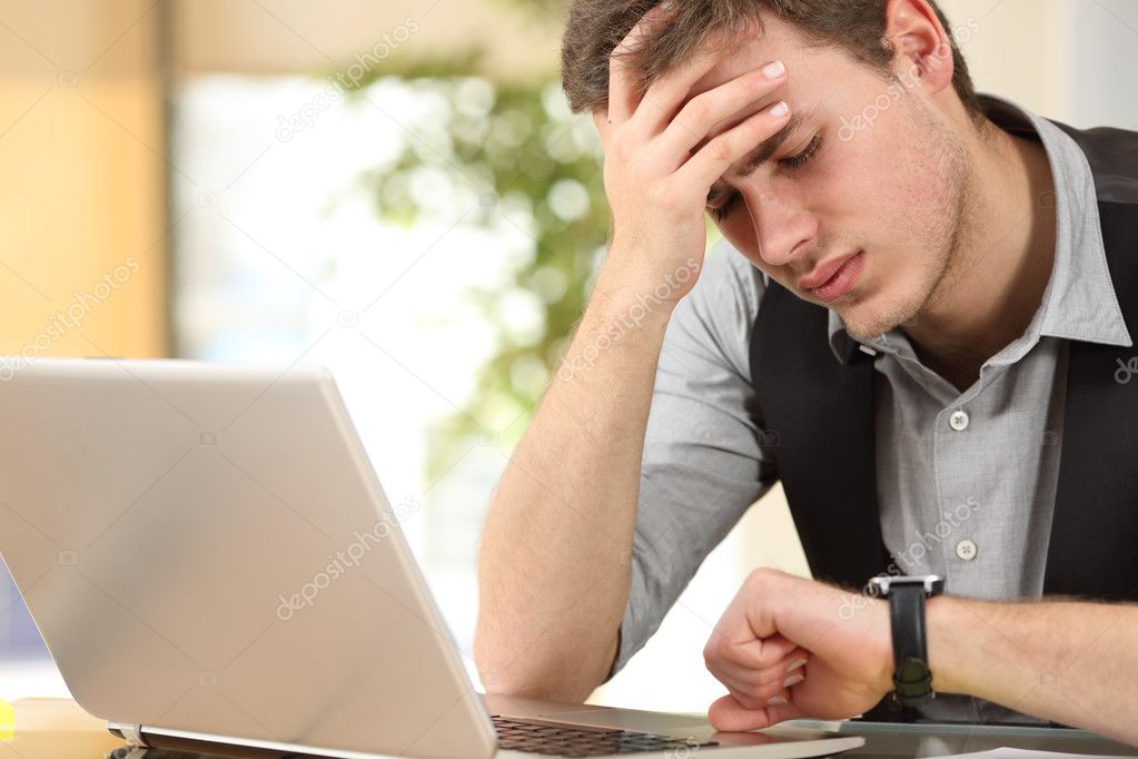 Worried businessman running out of time