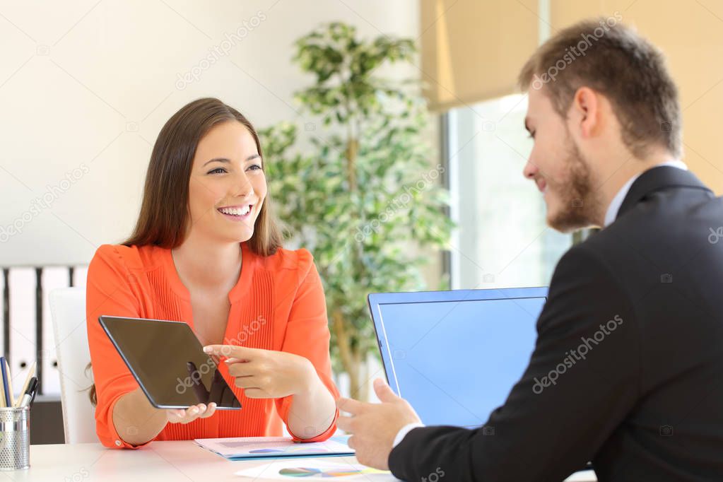 Saleswoman trying to sell to a client