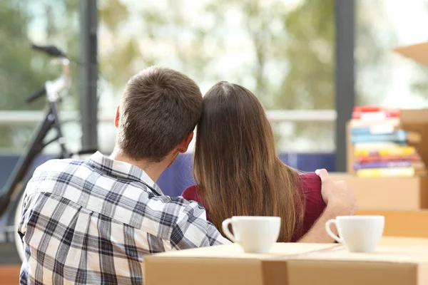 Couple of satisfied owners moving house