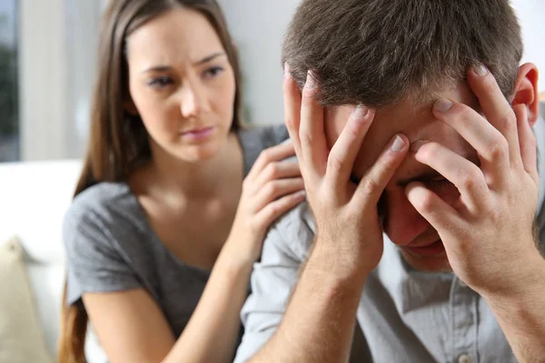 Sad man and a friend consoling — Stock Photo, Image