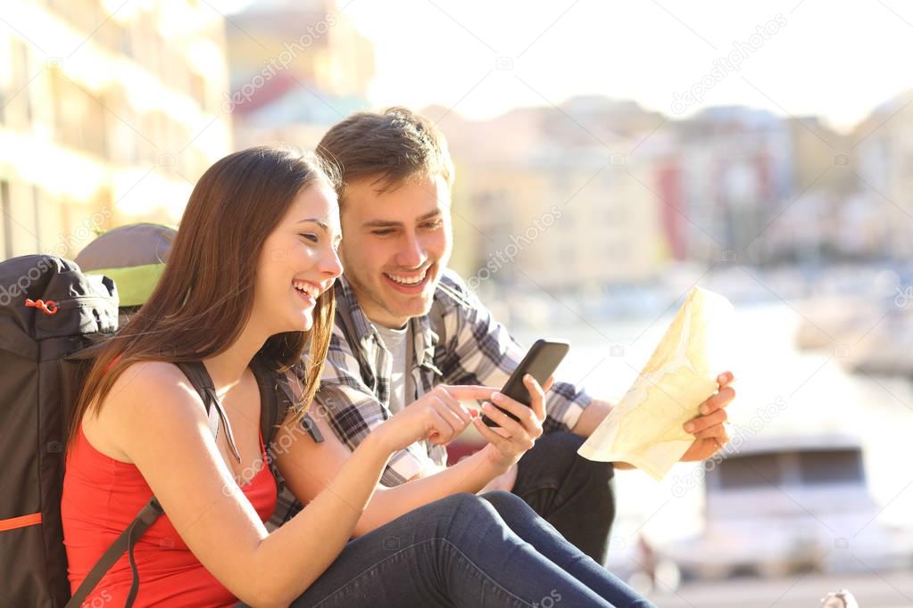 Tourists searching location on a smart phone