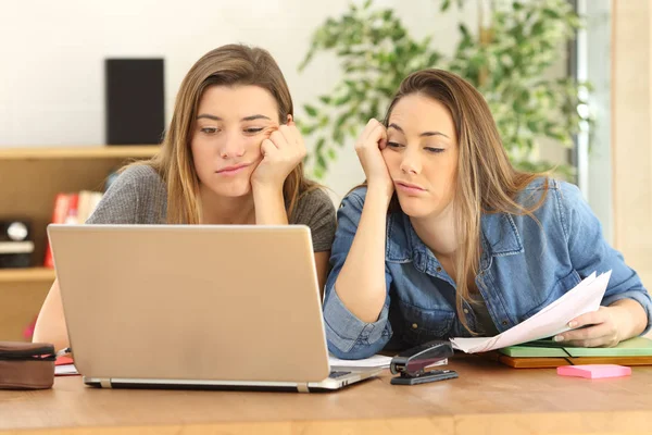 Bored or tired students doing homework — Stock Photo, Image