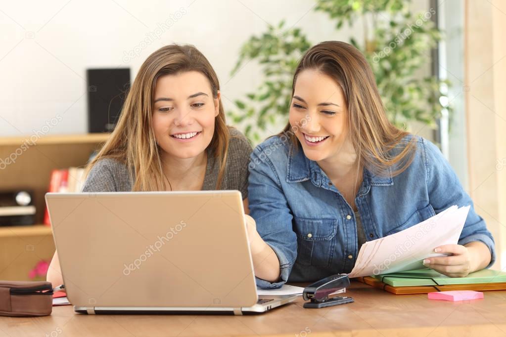 Students studying on line at home
