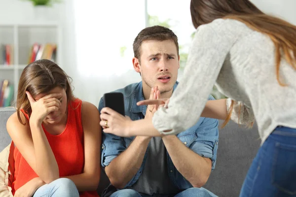 Cheater boyfriend and friend caught by phone — Stock Photo, Image