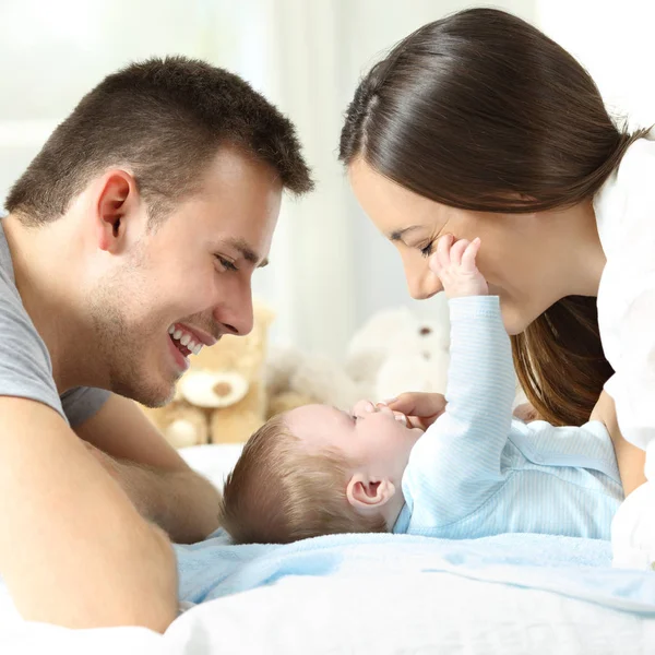 Baby playing with his parents — Stock Photo, Image