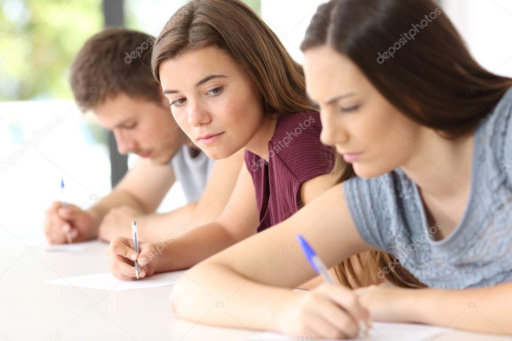 Student trying to copy an exam of a classmate