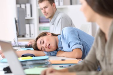 Fatigued employee sleeping at office clipart