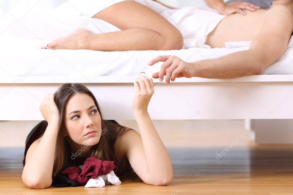 Lover hidden while man is having sex with his wife