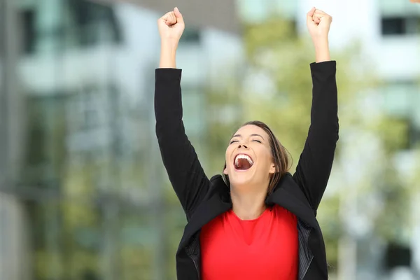 Excited executive raising arms after success — Stock Photo, Image