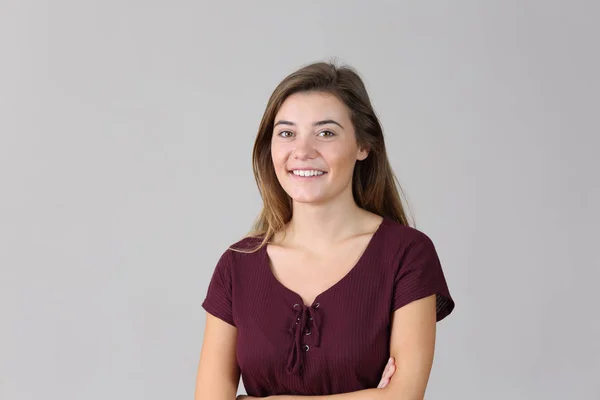 Portrait of a teen girl isolated on grey — Stock Photo, Image