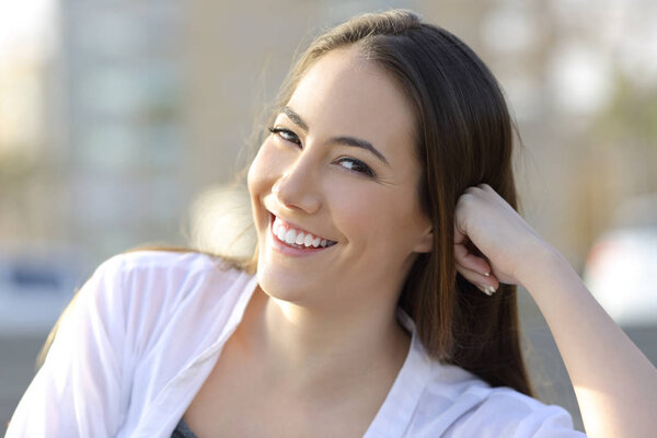 Beauty woman smile with healthy teeth looking at you